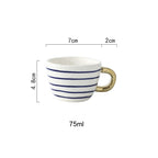 SacredHut | Cup with abstract geometric pattern and gold handle