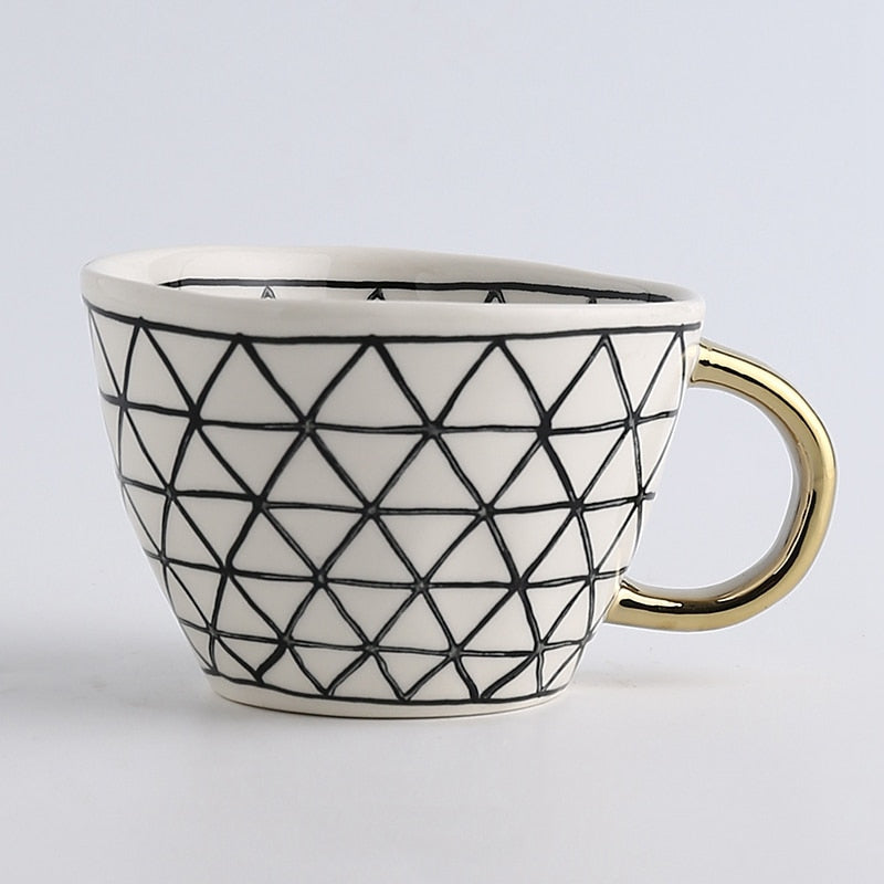 SacredHut | Cup with abstract geometric pattern and gold handle