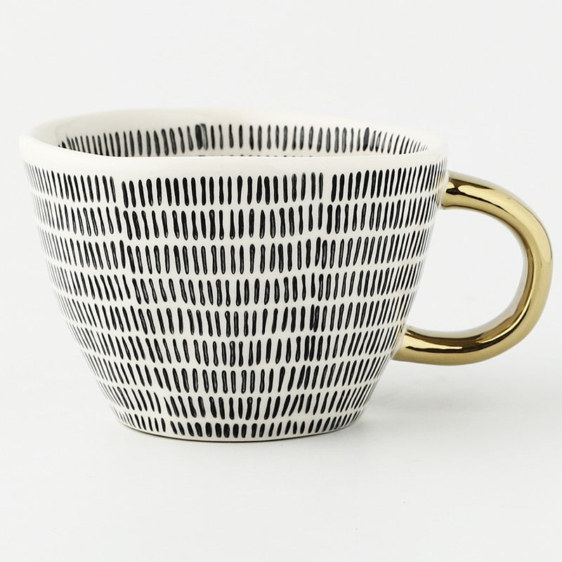 SacredHut | Cup with abstract geometric pattern and gold handle