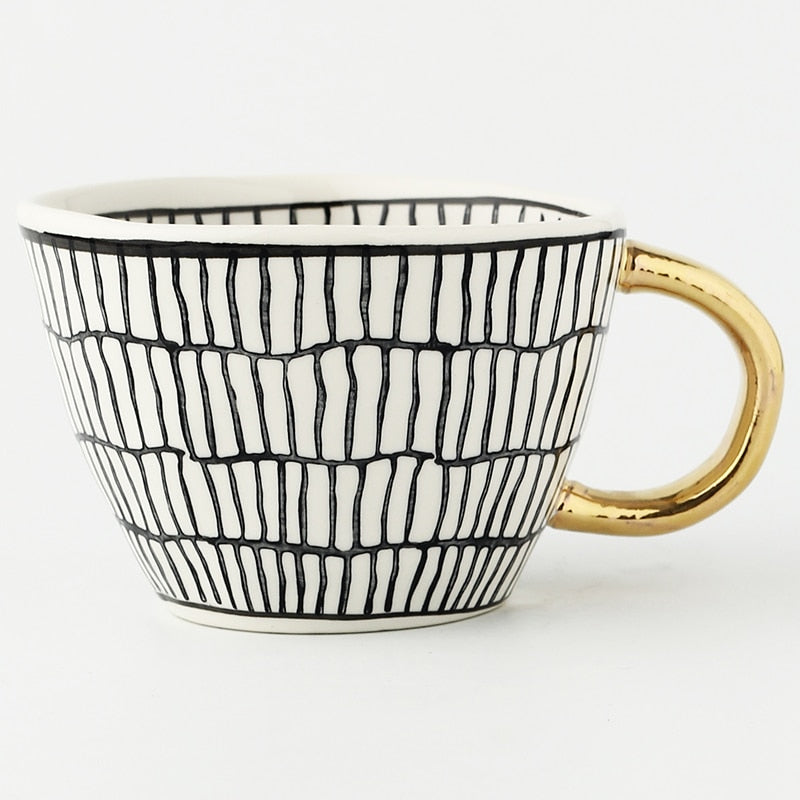 SacredHut | Cup with abstract geometric pattern and gold handle