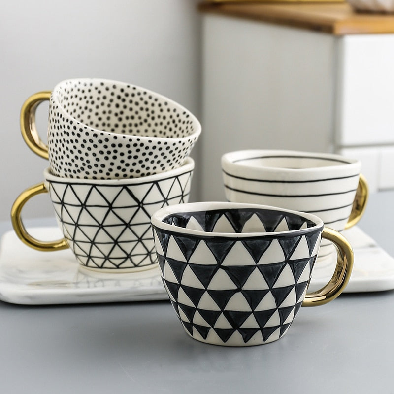 SacredHut | Cup with abstract geometric pattern and gold handle