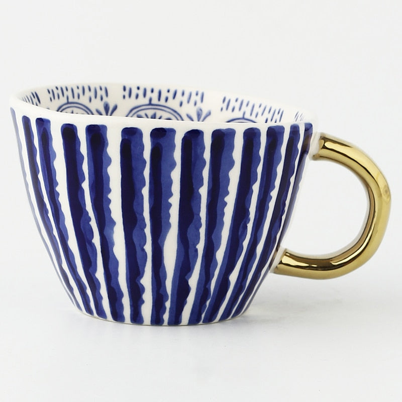 SacredHut | Cup with abstract geometric pattern and gold handle