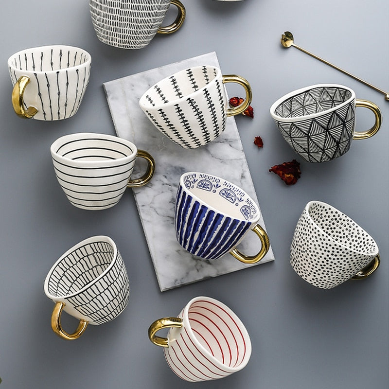 SacredHut | Cup with abstract geometric pattern and gold handle