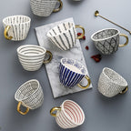 SacredHut | Cup with abstract geometric pattern and gold handle