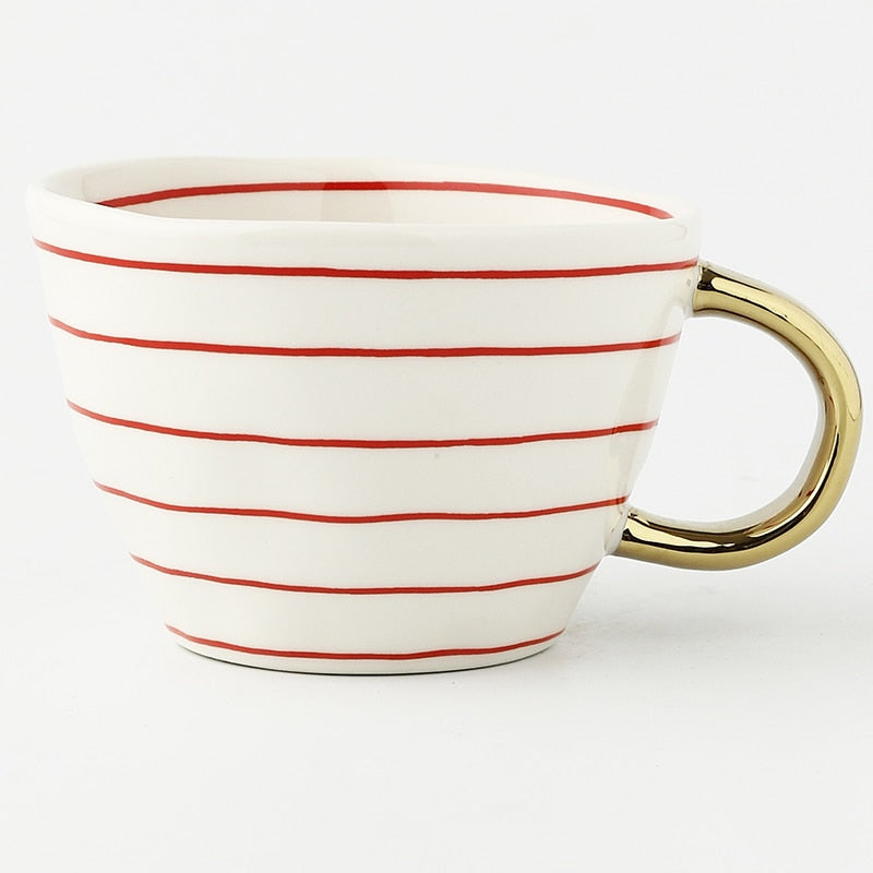 SacredHut | Cup with abstract geometric pattern and gold handle