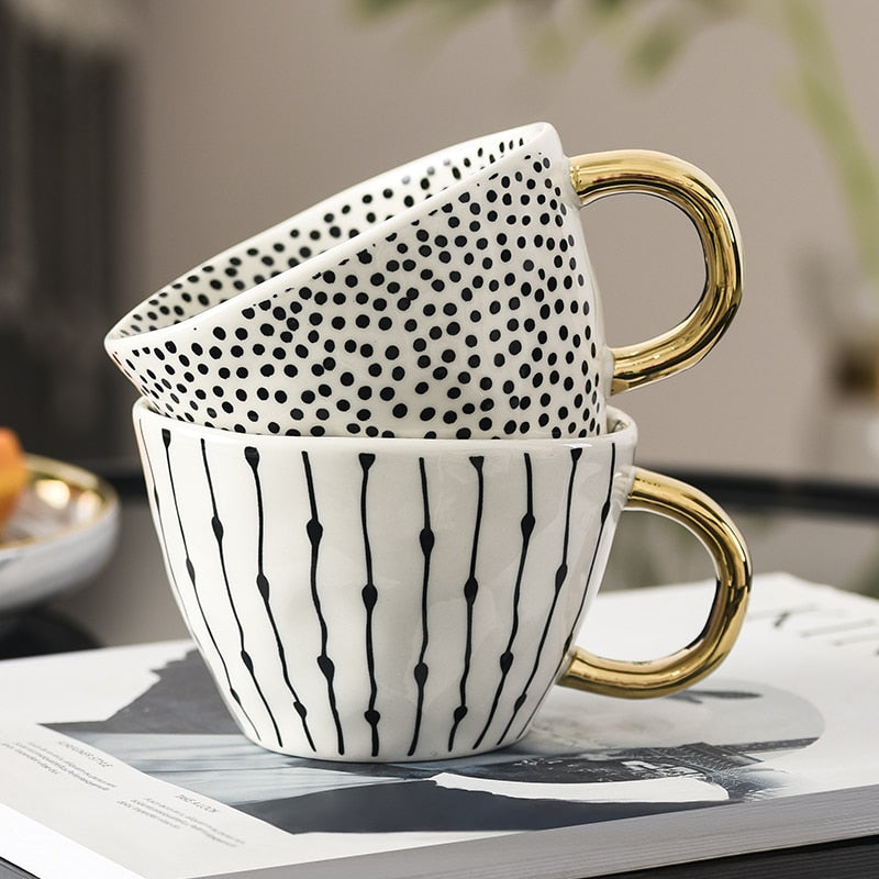 SacredHut | Cup with abstract geometric pattern and gold handle