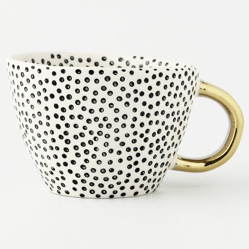 SacredHut | Cup with abstract geometric pattern and gold handle
