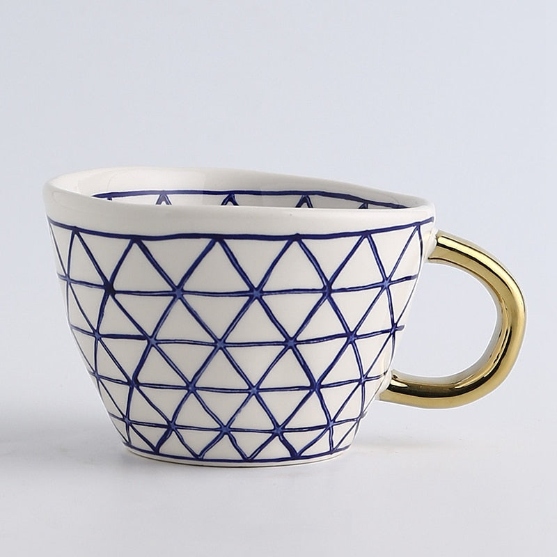 SacredHut | Cup with abstract geometric pattern and gold handle