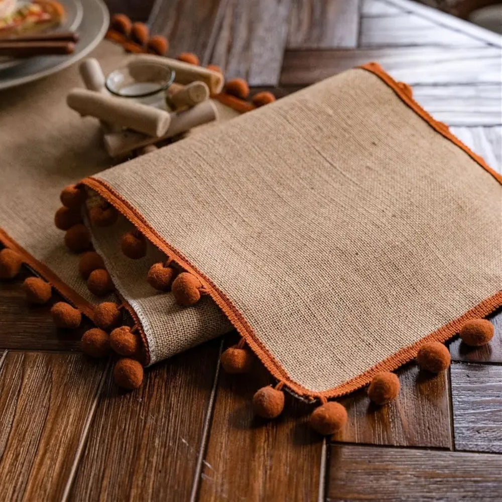 Jute Table Runner with Orange Pom-Poms, Boho Dining Table Decor — product view 5