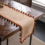 Jute Table Runner with Orange Pom-Poms, Boho Dining Table Decor — product view 2