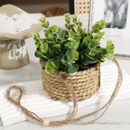 Hanging Artificial Plant in Woven Basket, Faux Eucalyptus or Rosemary — product view 1