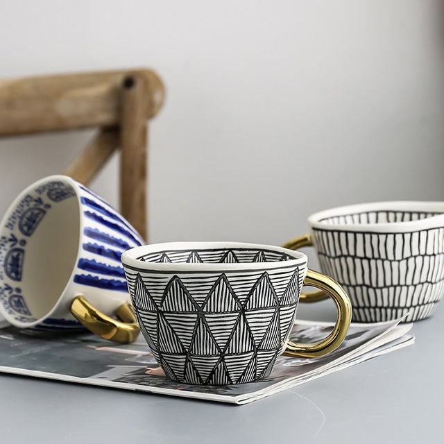 SacredHut | Cup with abstract geometric pattern and gold handle
