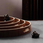 SacredHut | Slim, round serving trays made of wood