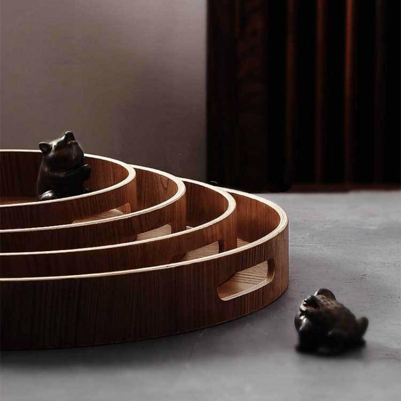 SacredHut | Slim, round serving trays made of wood